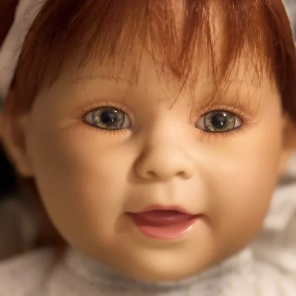 Adorable Baby Doll with Pink Bow - Picture 2 of 9